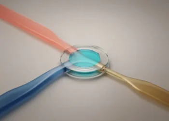 Three colored marketing pathways converge in a transparent measurement hub, illustrating weighted attribution for one customer decision.